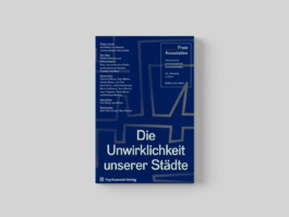 Buchcover der Zeitschrift „Freie Assoziation“ (Ausgabe „Die Unwirklichkeit unserer Städte“, Psychosozial-Verlag) mit abstrakten Linien auf blauem Hintergrund.